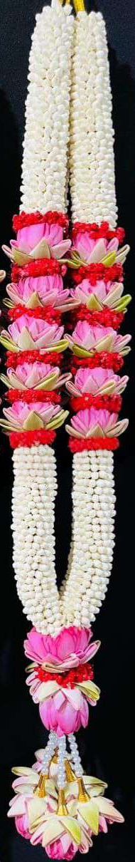 Jasmine garland with a pink lotus section banded in red, and lotus tassels.