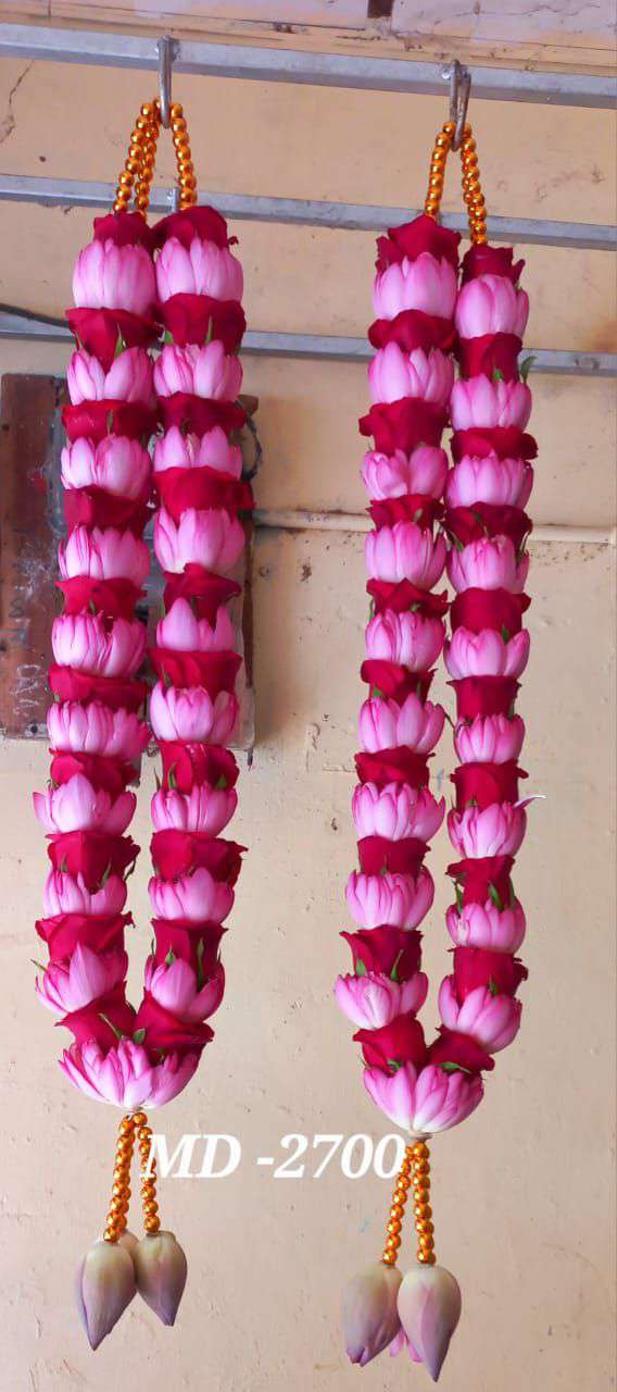 Pair of red-and-white bicolour rose garlands with gold bead hangers and lotus bud tassels.
