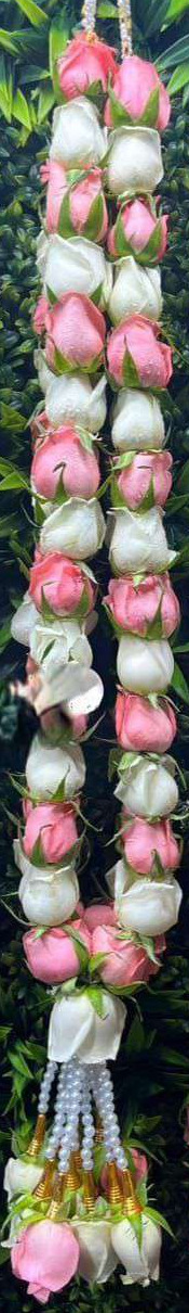 Garland alternating pink and white roses, with pearl strands and gold-cone rose tassels.